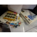 Folder containing used and un-used stamps mainly English and a selection of First Day Covers