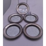5 x sterling silver bound and glass centred coasters, 3" dia, with the impressed mark Cartier and