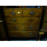 Regency inspired chest of 2 short and 3 graduating long drawers with oval handles and fitted