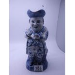 Blue and white Delft ware Toby Jug, signed to base and monogrammed LE, 11" tall