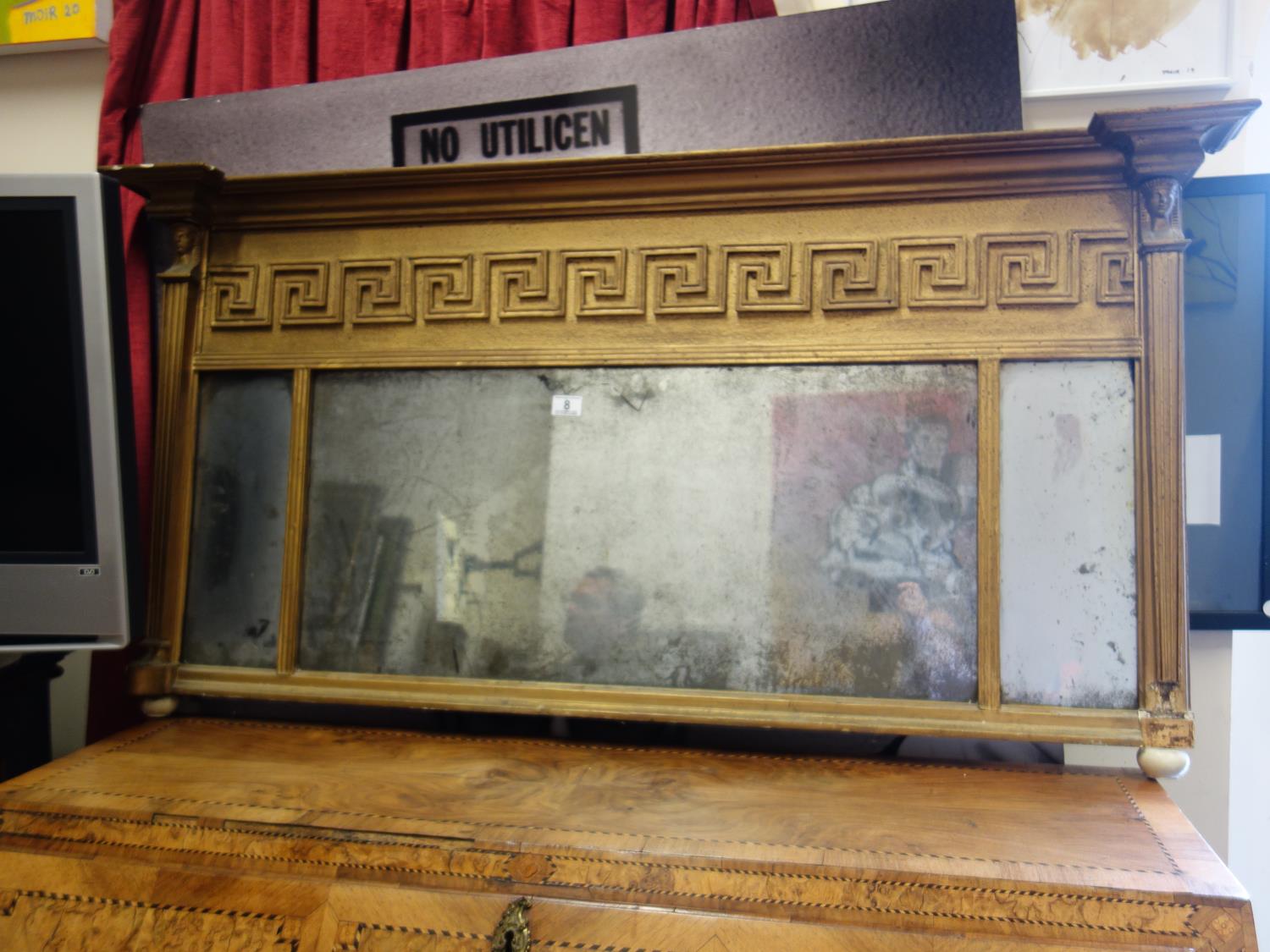 Classical inspired early 19 th century over mantle mirror with triple mirror section to the front,