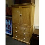 Pine Linen press 2 cupboards to the top with shelving enclosed above a cluster of 2 short and 3 long