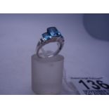 Good quality Ladies blue Topaz 9ct gold ring with diamond chips, 3 x baguette cut blue Topaz to
