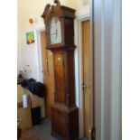 19 th century Mahogany Longcase Clock with an 8 day movement striking on a bell,