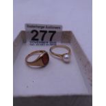 2 x small 9ct gold rings, 1 with pearls 1 with blood stone 5.6 grams