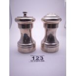 Cartier, a sterling silver pepper grinder and salt pot, both marked Cartier 925,