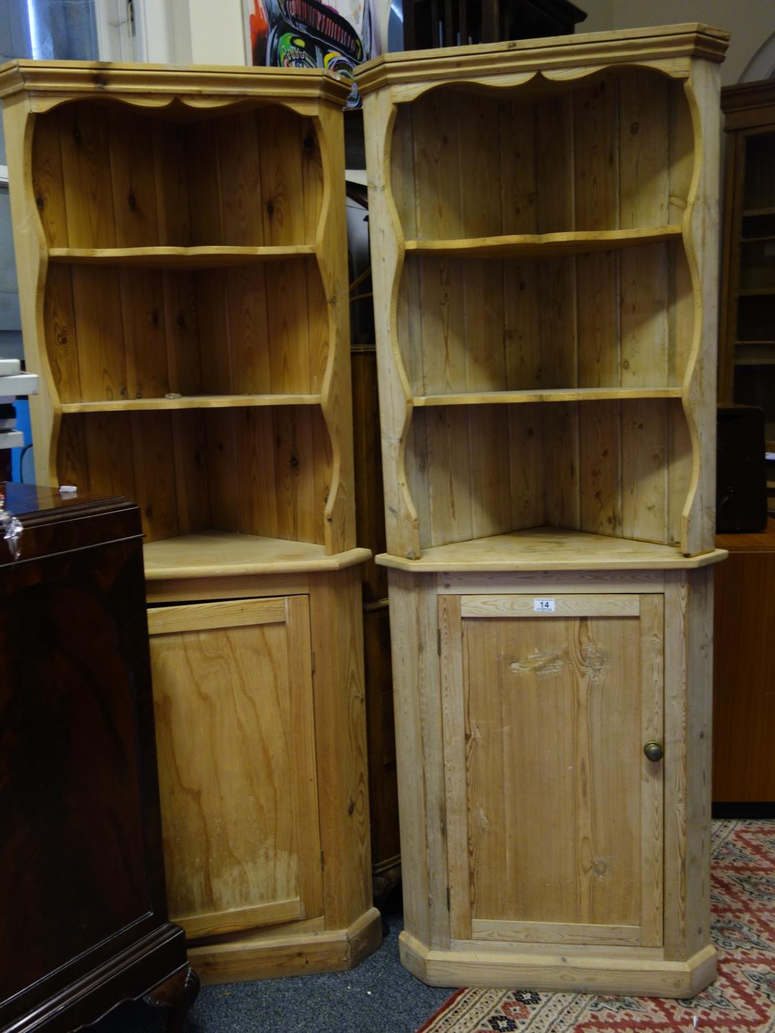 2 x similar stripped pine corner units each on 6' tall containing 3 shelves to the top section above
