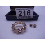 Stunning circular Sapphire and Diamond encrusted brooch, with matching earrings, the brooch measures