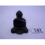 Small Asian bronze Buddha, 2.1/4" tall signed to base est 30-50