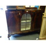 Early 20th century show cabinet with a glazed front centre section flanked by 2 cupboards containing