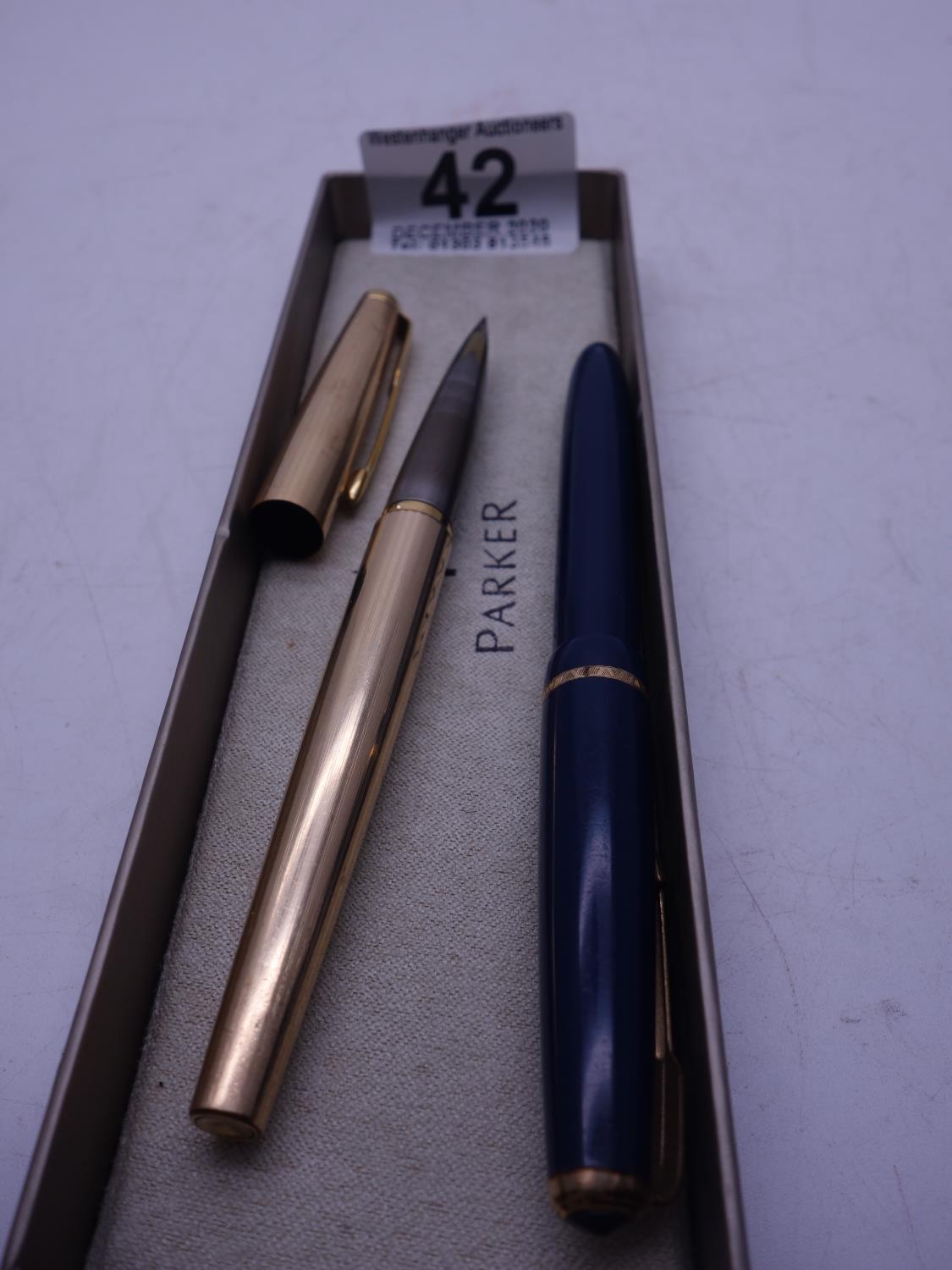 Parker GOLD coloured Fountain pen, made in USA, and a Parker Navy blue Slim fold, with 14ct GOLD