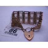 Vintage 9ct GOLD heavy Ladies bracelet with heart shaped locket and safety chain, 1.3/4" wide, 8"