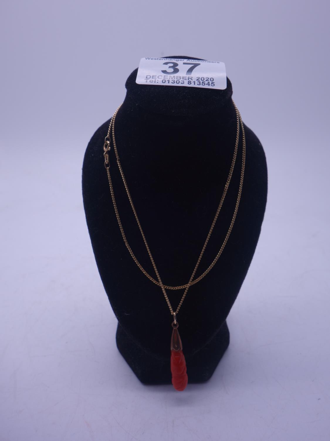 9ct GOLD chain with 9ct GOLD highlighted pendant of carved coral, 5.2 grams,