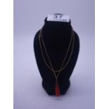 9ct GOLD chain with 9ct GOLD highlighted pendant of carved coral, 5.2 grams,