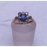 18ct gold antique Ladies Sapphire and Diamond ring, a Solitaire Sapphire to the centre surrounded by