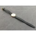 A ladies 9ct yellow gold wristwatch, by Mappin, the silvered dial set-out with baton numerals and