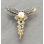 Caduceus style brooch set with amethysts, diamonds and cultured pearl