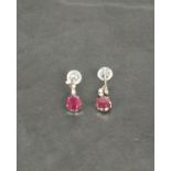 A pair of 18ct white gold ruby and diamond drops, rubies 2.00ct, diamonds 0.08ct