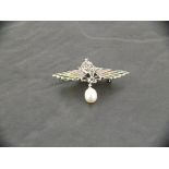 A silver brooch / pendant set with marcasite, plique a jour and a suspended pearl
