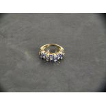 A sapphire and diamond Art Deco style ring, the stones totalling approx. 3ct, set in a 9ct yellow