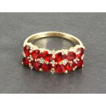 A ruby and diamond Art Deco style ring, the arrangement of Tanzanian Songea rubies set with diamonds