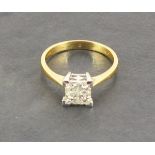 An 18ct yellow and white gold princess cut diamond invisible set ring, diamonds approximately 0.