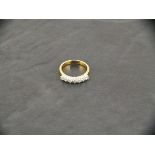 An 18ct yellow gold 7 stone diamond ring, 0.50ct