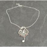 A plique-de-jour necklace, in the Art Nouveau style, modelled as a fairy, with a pearl suspended