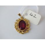8ct gold red stone set pendant