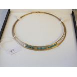 9ct. Egyptian style collar with turtrix style stones, fitted box 14.3g. net