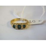 Emerald and diamond seven stone half hoop ring, set in 18ct. size O 4.7g.