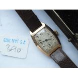 Gents oblong 9ct wrist watch in a box