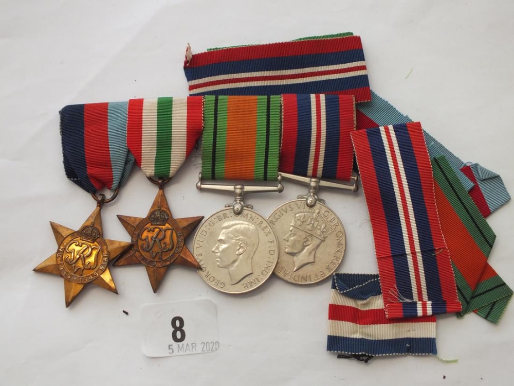 A bar of four WWII medals