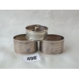 Pair of oval heavy napkin rings with line decoration, Lon 1924 by MH, also another 128g.