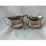 Cream jug and sugar basin, en-suite to the previous lot, 264g.