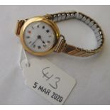 Ladies vintage 18ct. wrist watch on metal strap