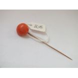 Gold mounted coral button shaped stick pin