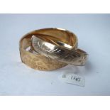 Two rolled gold bangles