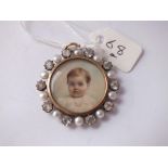 Gold mounted circular paste set portrait locket