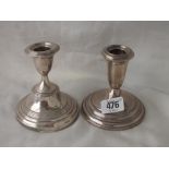 Pair of American circular short candlesticks, 4” high marked Sterling