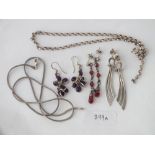 Three pairs of silver earrings, chains etc.