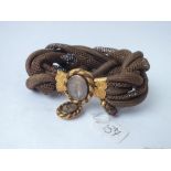 19thc large plaited hair bracelet with gold mounts & gold hair locket clasp 18.g inc