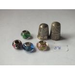 Charles Horner silver thimble and one other together with 4 silver and glass charms