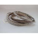 Six assorted silver bangles