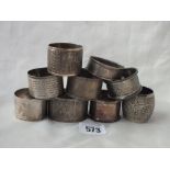 Group of nine napkin rings, including foreign examples, 240g.