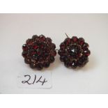 Pair oval garnet brooches