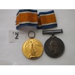 A pair of WWI medals to PTE. T.H. Barker – the Queens Regiment