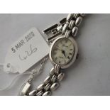 Ladies silver wrist watch on link strap