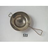 Tea strainer with wire work handles, 3.25” dia. Shef 1936 by WHS 28g.
