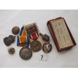 A 1914/8 war medal to SGT. G. R. Spoors of 43 BN A.I.F. (No 569) and badges etc.